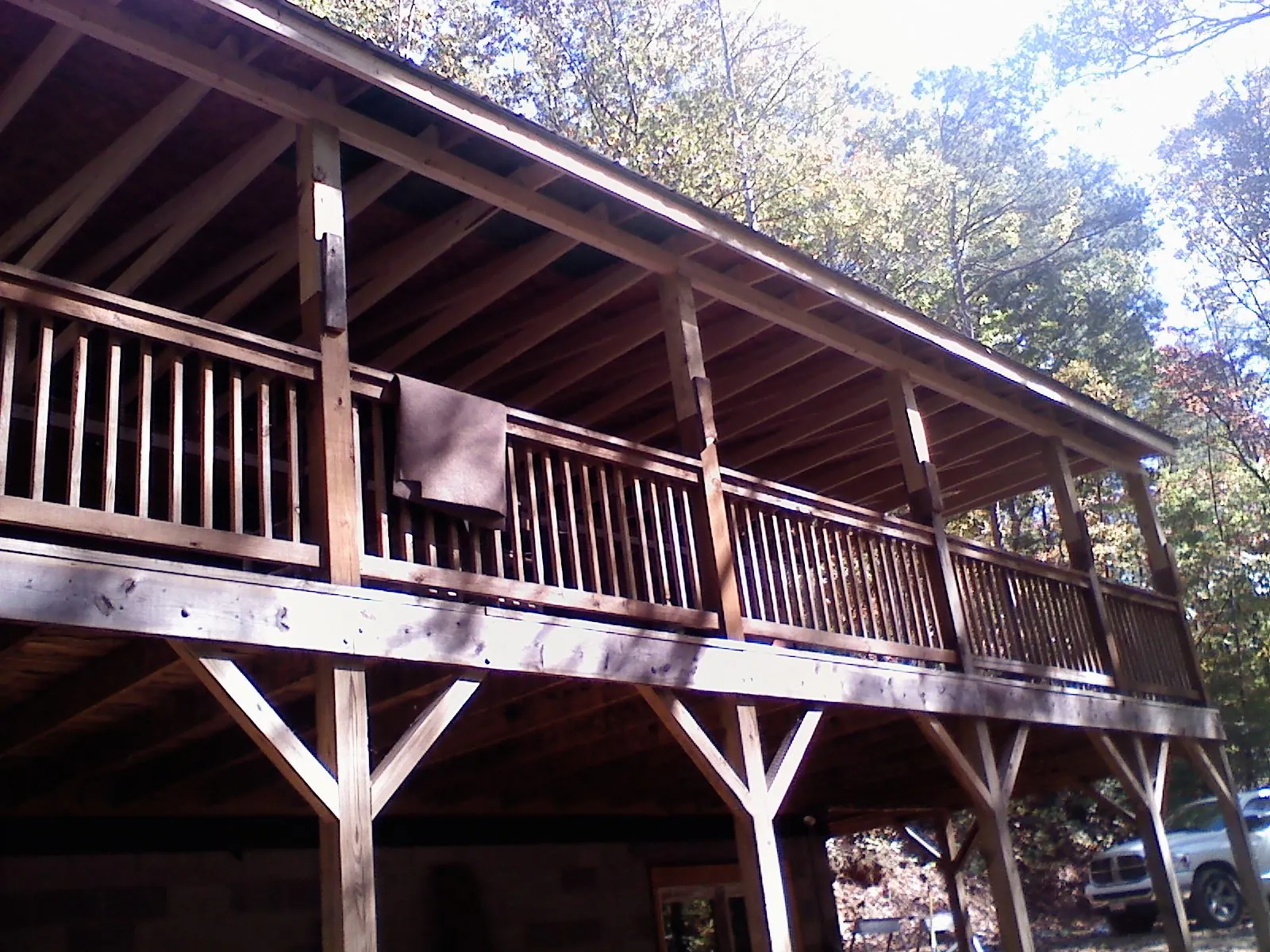 Timber framing under a new elevated porch and deck — Roof Leak Repair in Fertile by Roofing Brothers